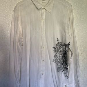 It’s white color,xl size and pop icon brand shirt.